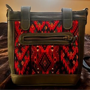 Handmade embroidered leather handbag made by Ponchos in Guatemala
